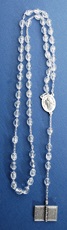 Corona rosario libro Padre nostro plastica trasparente metallo Rosari